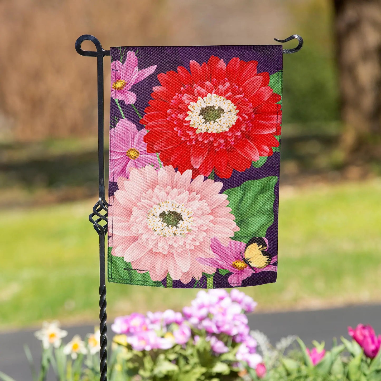 Blooming Gerbera Burlap Garden Flag with vibrant purple background and red pink blooms on Tampa Home & Garden Store