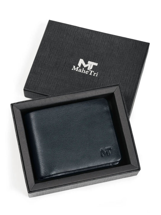 Slim blue Kodiak leather billfold wallet in a black box with MaheTri logo on Tampa Home & Garden Store