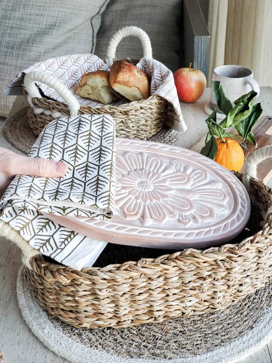 Bread warmer set with pink ceramic lid woven basket and patterned tea towel by KORISSA on Tampa Home & Garden Store
