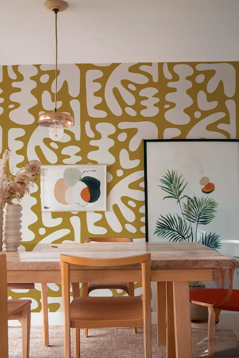 Bubbly Mustard Peel-and-Stick Wallpaper with abstract white shapes on a dining room wall on Tampa Home & Garden Store