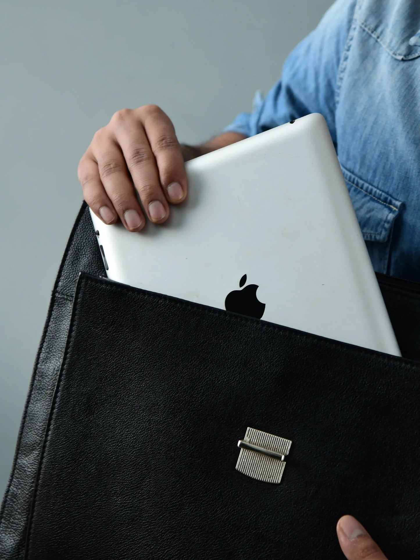 Business Attache Laptop Bag in black leather with Italian Finish holding a white Apple MacBook on Tampa Home & Garden Store