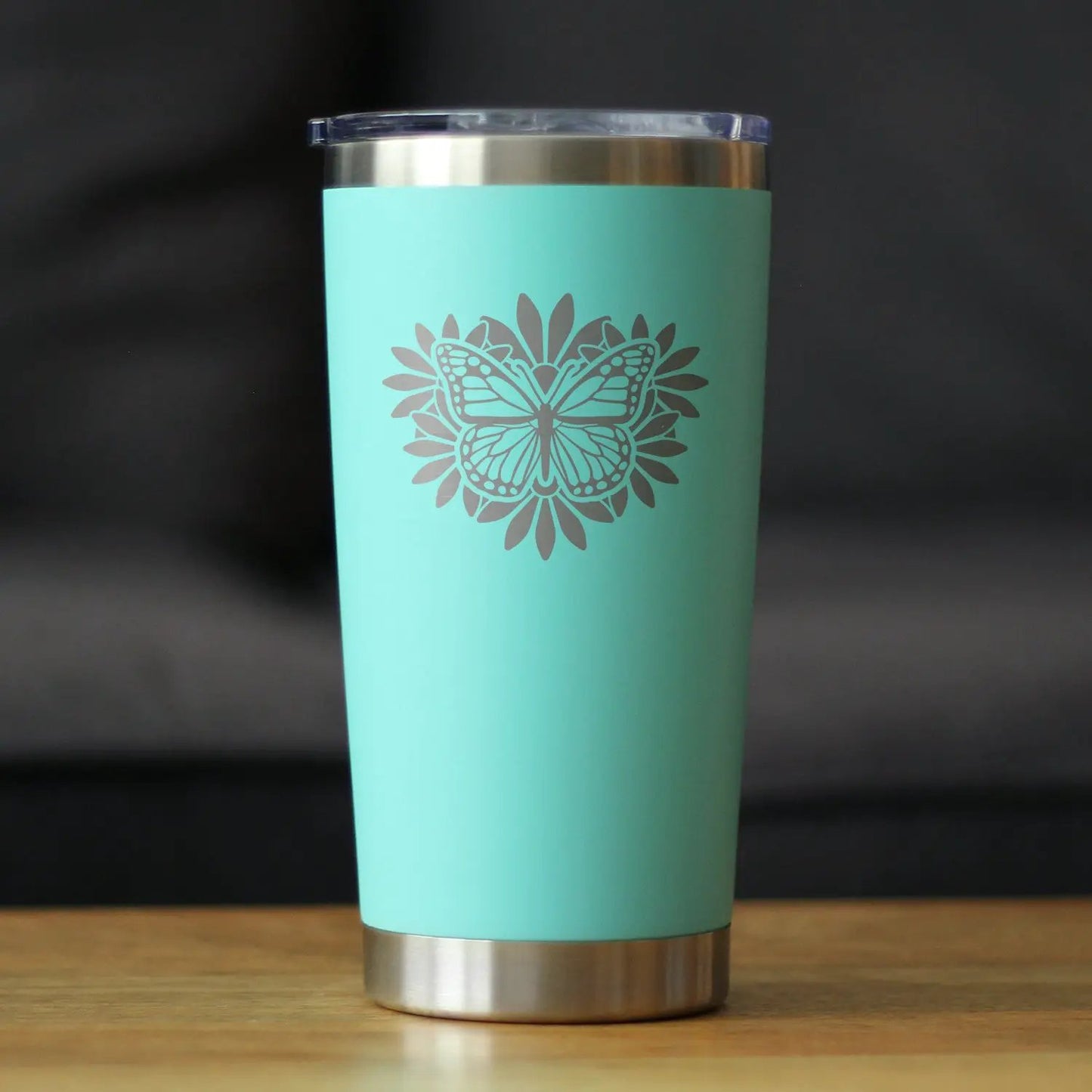Butterfly 20 oz coffee tumbler mint teal with sliding lid and silver base on Tampa Home & Garden Store