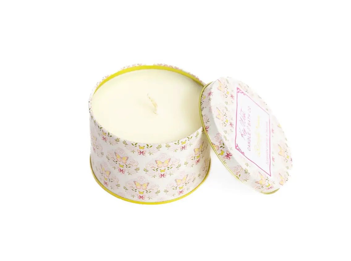 Butterfly Kisses candle honeydew & peonies in floral tin with yellow rim by Key West Cand Co on Tampa Home & Garden Store