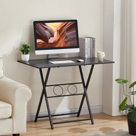 Compact black metal foldable desk for small spaces with slim dark tabletop on Tampa Home & Garden Store