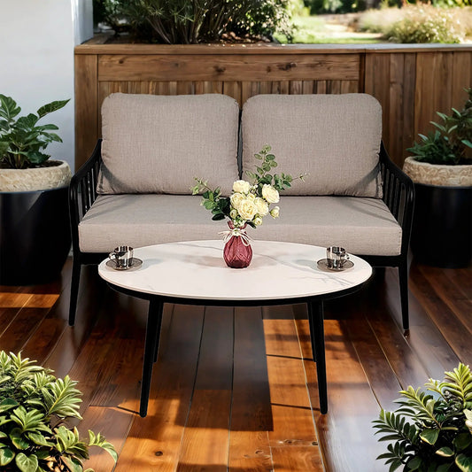 2pc outdoor aluminum patio loveseat set with beige cushions and black frames on deck on Tampa Home & Garden Store