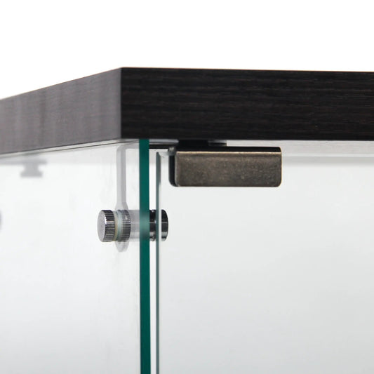 Glass display cabinet with door close-up showing dark wood top, glass panels and metal hardware on Tampa Home & Garden Store