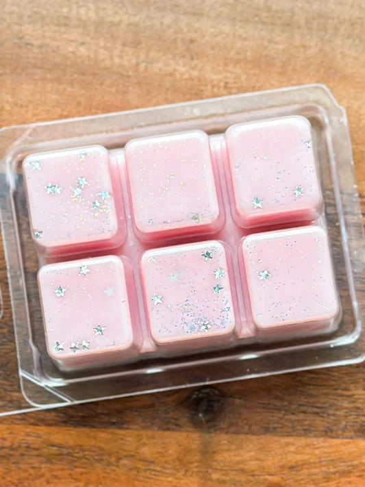 Moonlit Tea Garden Wax Melt set of 6 pink squares with blue star glitter in clear tray on Tampa Home & Garden Store