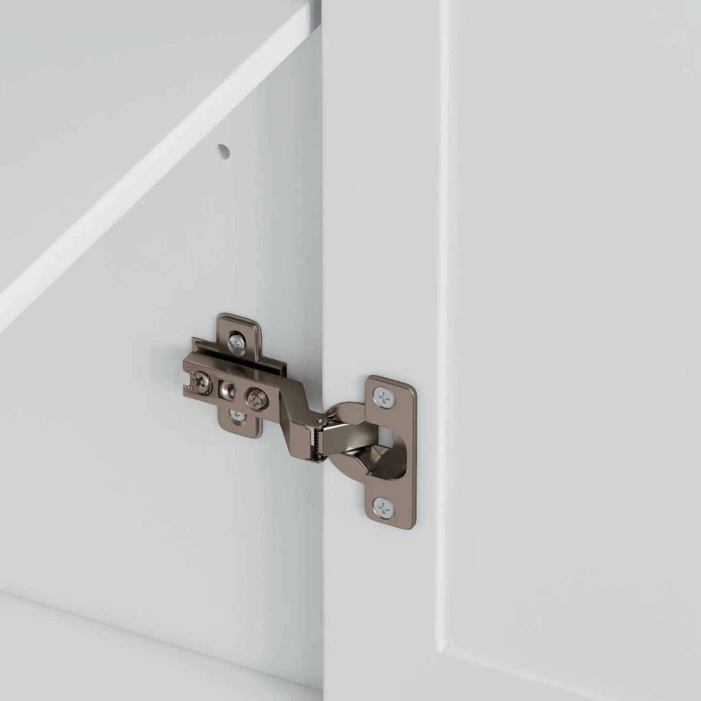 Kitchen island cabinet hinge in brushed metal on white cabinet panel on Tampa Home & Garden Store