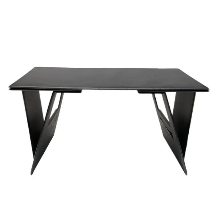 Foldable laptop desk and computer stand in black metal with angled V-shaped legs on Tampa Home & Garden Store