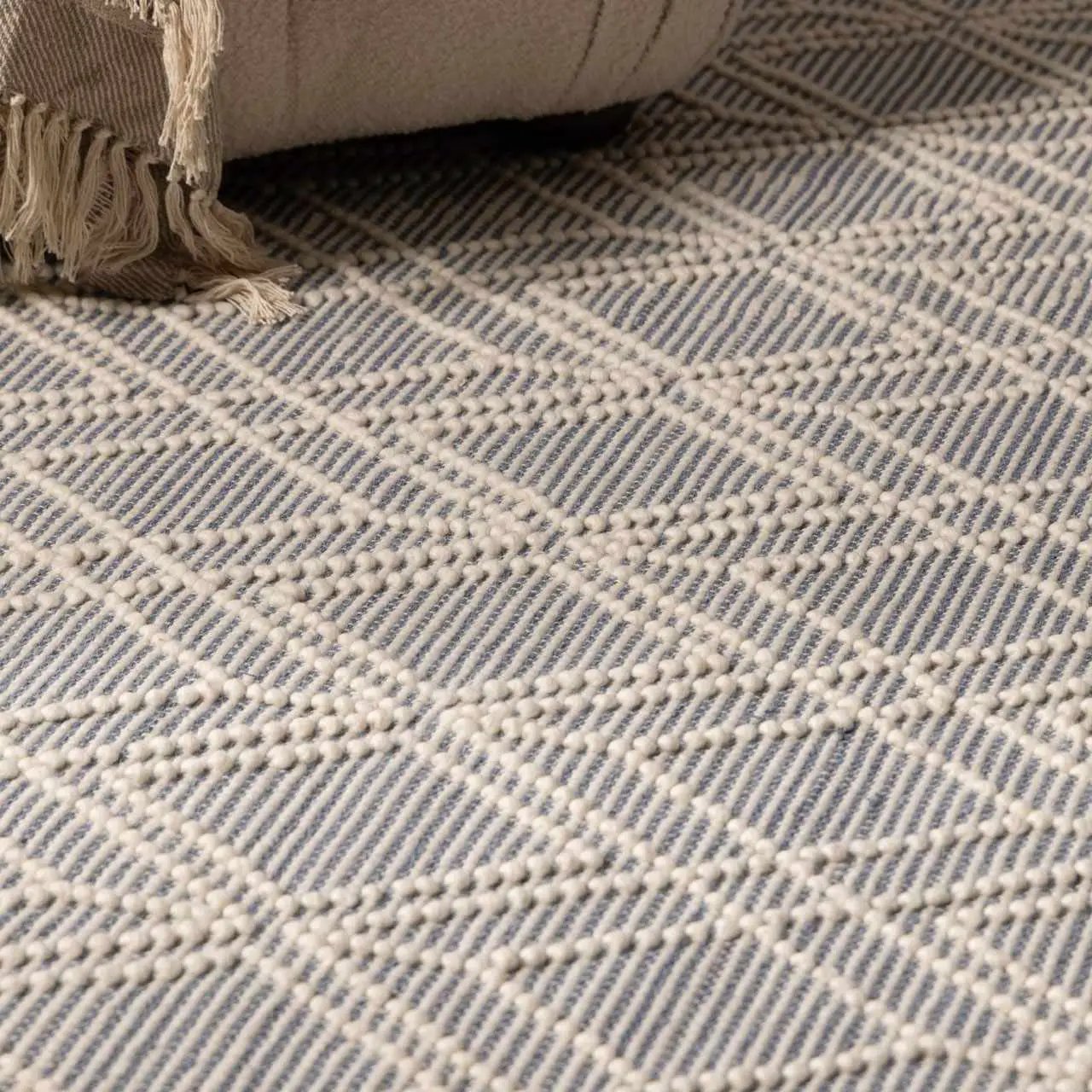 Ramsbury Denim Blue Wool Rug With Trellis, hand-woven in denim blue/ivory tones on Tampa Home & Garden Store