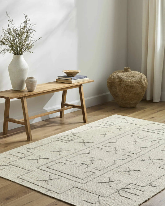 Chanda beige wool area rug hand woven with a subtle geometric pattern Boutique Rugs on Tampa Home & Garden Store