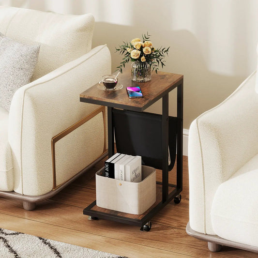 C-Shaped Side Table with black frame and canvas pouch holds yellow rose vase and coffee cup on Tampa Home & Garden Store