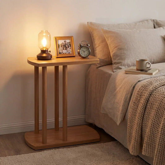 Narrow 2-tier C-shaped teak wood bedside table with four legs and rounded base on Tampa Home & Garden Store