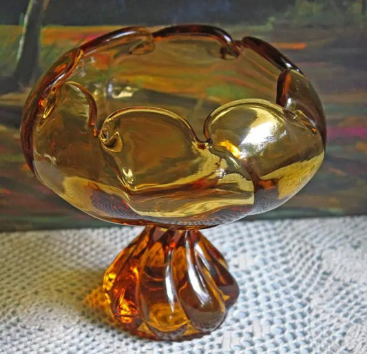 Amber glass footed candy bowl with scalloped rim and ornate pedestal base on Tampa Home & Garden Store
