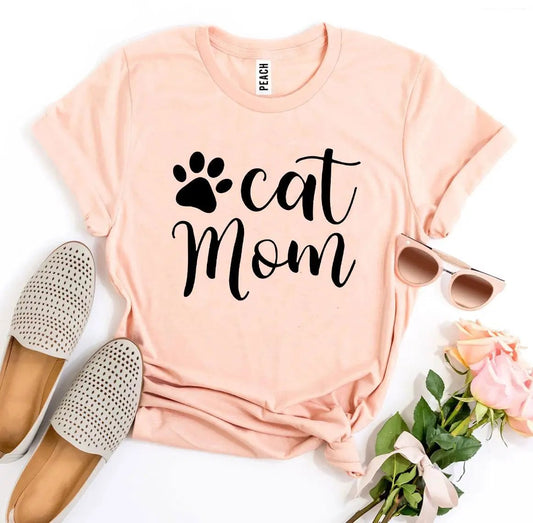 Pink Cat Mom T-shirt with black paw print design Peach tag on Tampa Home & Garden Store