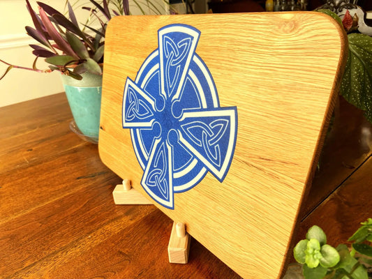 Celtic Cross charcuterie board white oak handmade with blue graphic on a small wooden stand on Tampa Home & Garden Store
