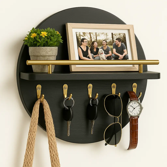 Round black wooden key holder and wall mount organizer with five brass hooks; shelf holds plant on Tampa Home & Garden Store
