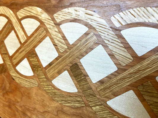 Cherry Charcuterie Board with oak maple Celtic knot inlays by Fitzgerald Custom Woodcraft on Tampa Home & Garden Store
