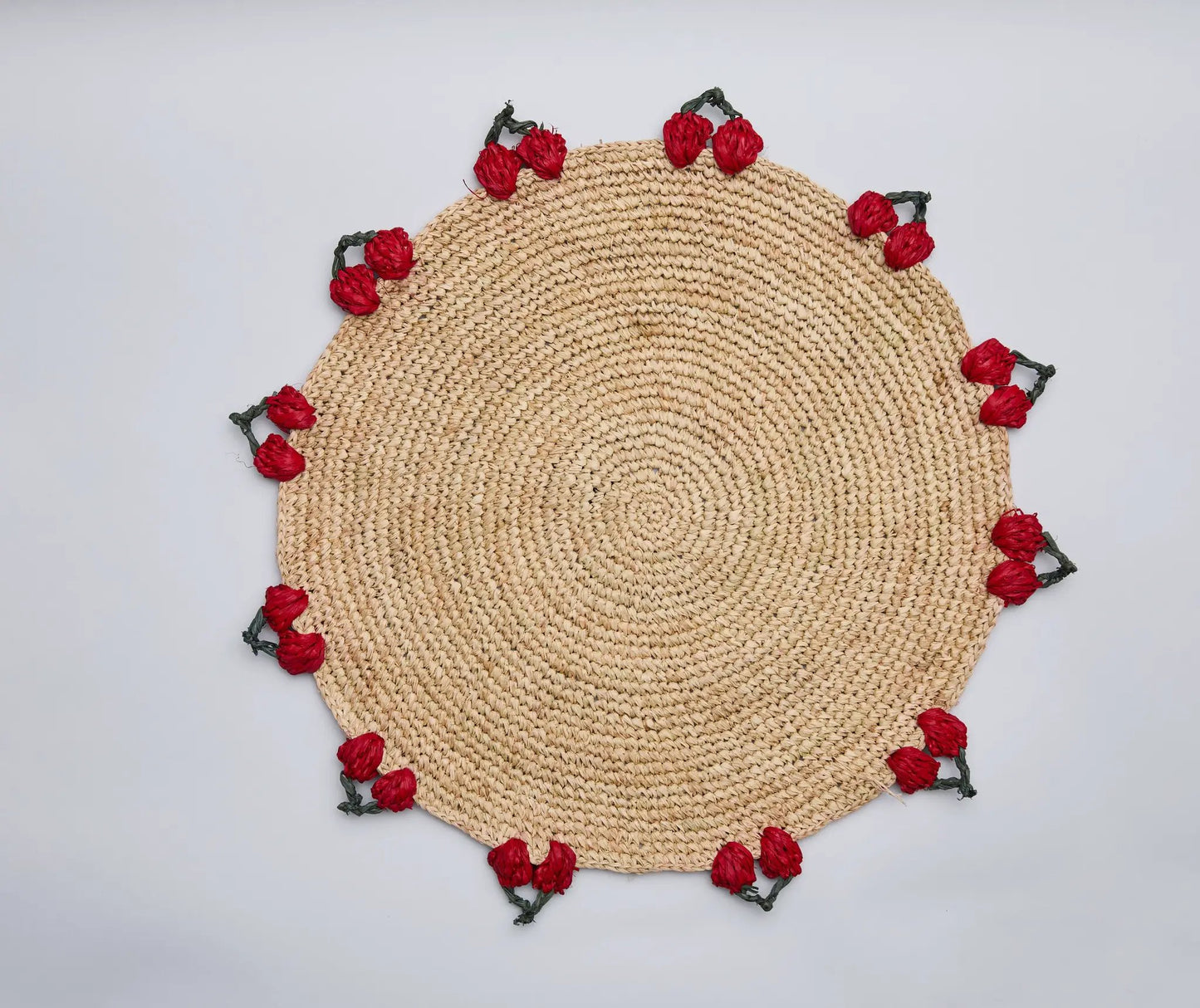 Cherry scalloped placemat hand crocheted raffia with red flower accents around edge on Tampa Home & Garden Store