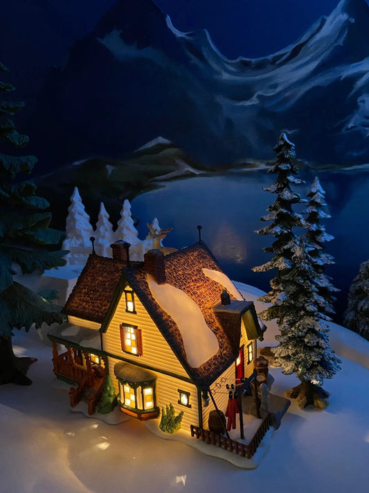 Harper's Farmhouse illuminated Christmas village house with snow and pine trees by Anything Discovered on Tampa Home & Garden Store