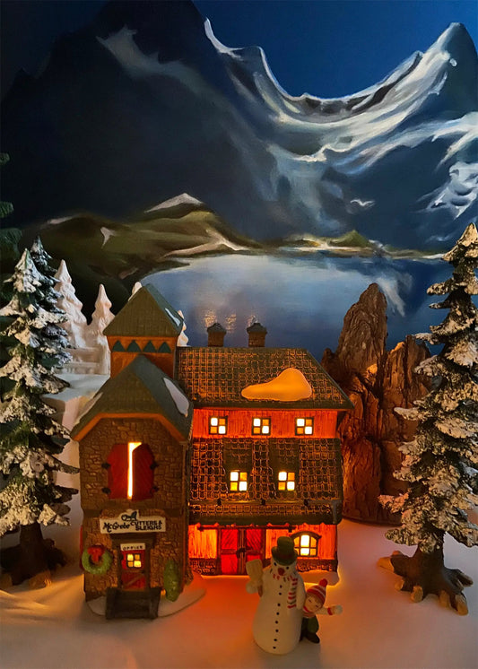 McGrebe Cutters Christmas village accessories illuminated cottage amid snowed trees and snowmen on Tampa Home & Garden Store