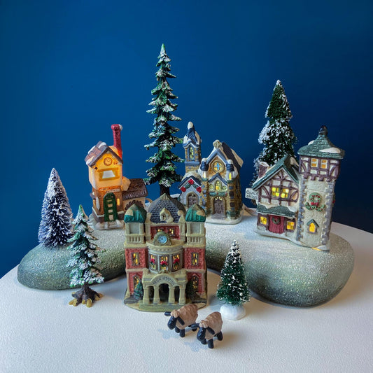 Christmas Village Collection of Small Illuminated Houses. Set of 4 Bldgs: Mill, 2 Churches, Train St., Council Offices, 2 Sheep and 3 Pines. - Tampa Home & Garden Store