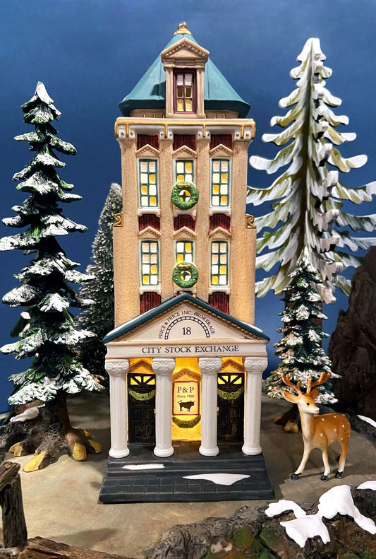 Department 56 Christmas Village Brokerage House with lit windows, wreaths, and snowy trees on Tampa Home & Garden Store