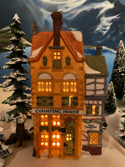 Dept 56 Christmas Village House Illuminated brick counting house with snow and warm windows on Tampa Home & Garden Store