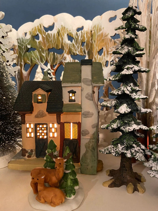 Martin House First Edition Christmas Village porcelain house with lighted windows and snow on Tampa Home & Garden Store