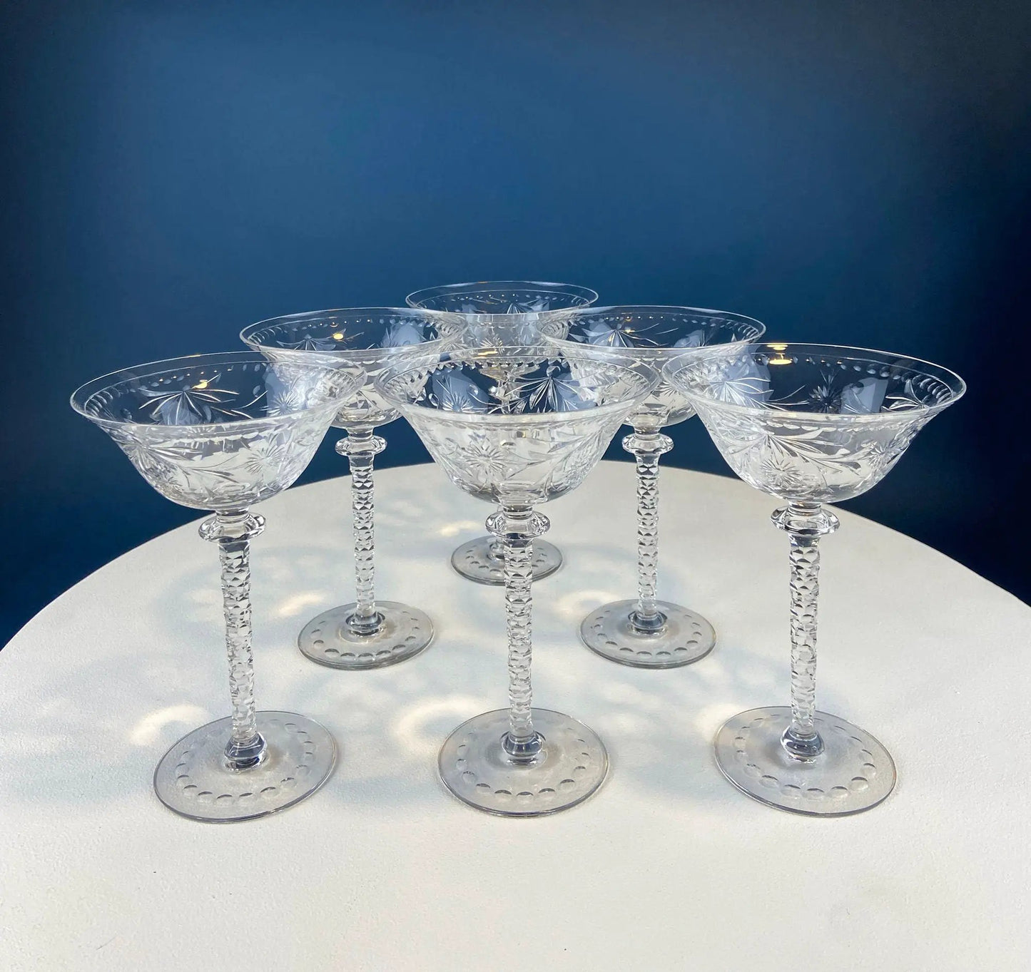 Clear crystal wine goblets with frosted leaf ball, etched bowl patterns and faceted stems on Tampa Home & Garden Store