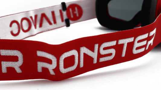 Limited Edition Havoc Surronster Infinity Goggles close-up, red strap with white lettering on Tampa Home & Garden Store