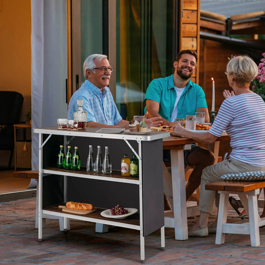 Folding camping table with 2-tier open shelves for BBQ, white top and silver frame on Tampa Home & Garden Store