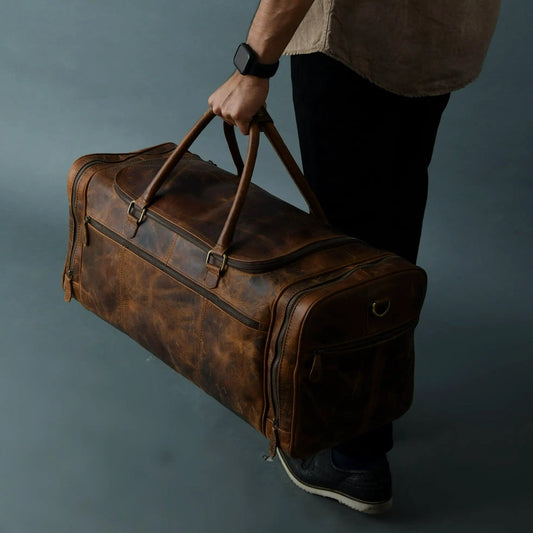 Cohen Buffalo Weekender Duffle in vintage brown leather with rugged handles on Tampa Home & Garden Store