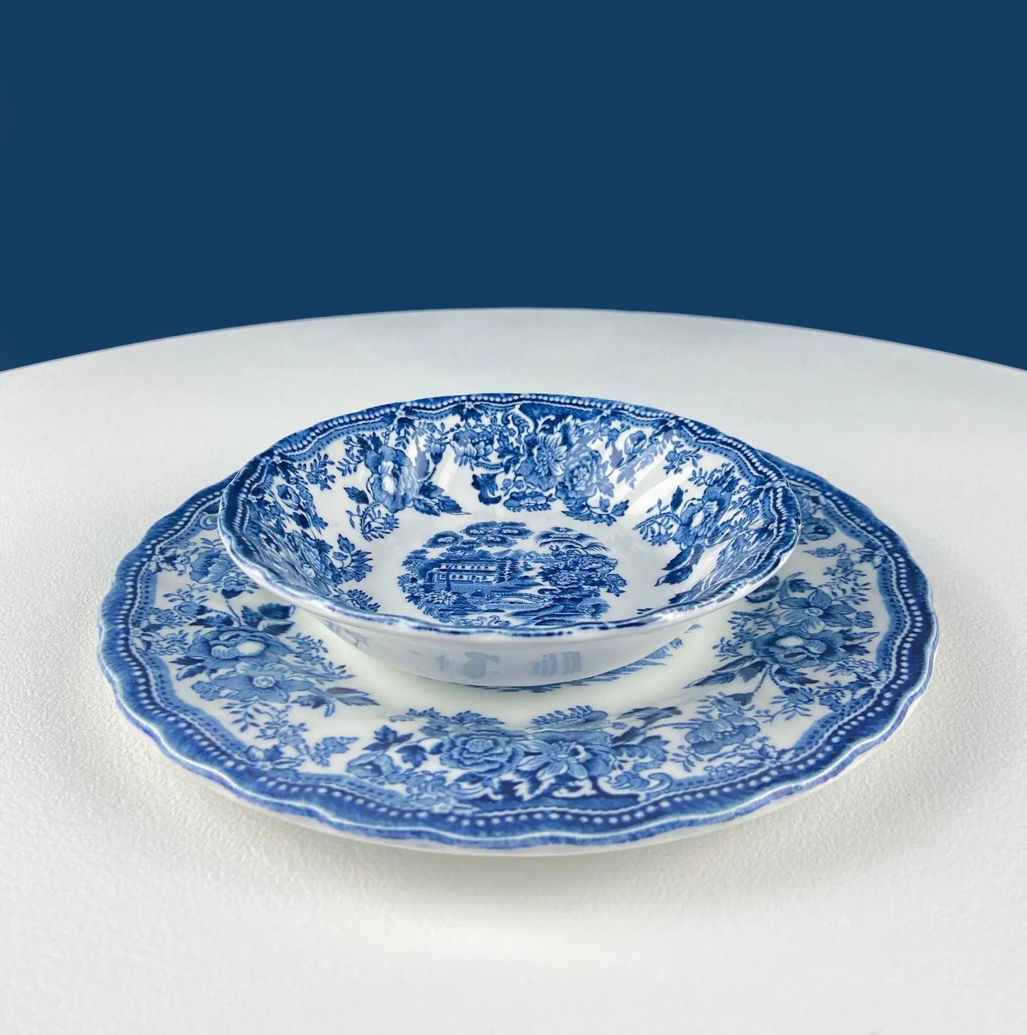 Blue and white English transferware dinnerware set: 3 plates and 2 bowls with intricate pattern on Tampa Home & Garden Store