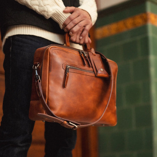 Continental Briefcase in Italian leather, cognac brown with top handles and front zip pocket on Tampa Home & Garden Store
