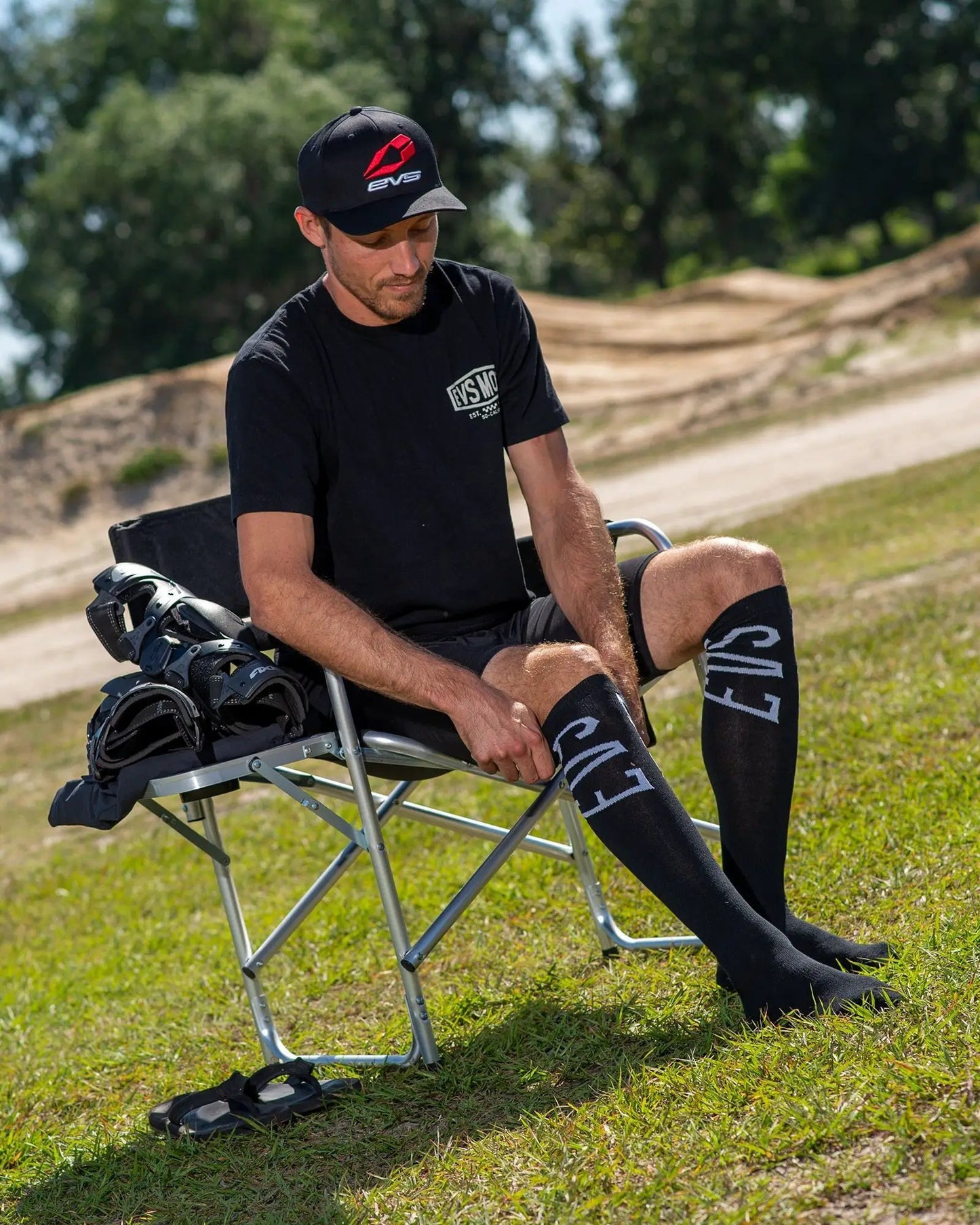 Coolmax Moto Socks by EVS Sports in black with bold white EVS lettering on Tampa Home & Garden Store