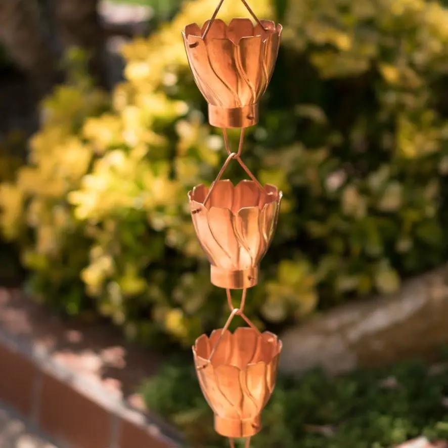 Copper rain chain with three floral petal cups for outdoor garden décor on Tampa Home & Garden Store