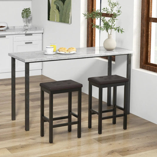Three 24 Inch bar stools with padded brown seats black metal legs and footrests on Tampa Home & Garden Store