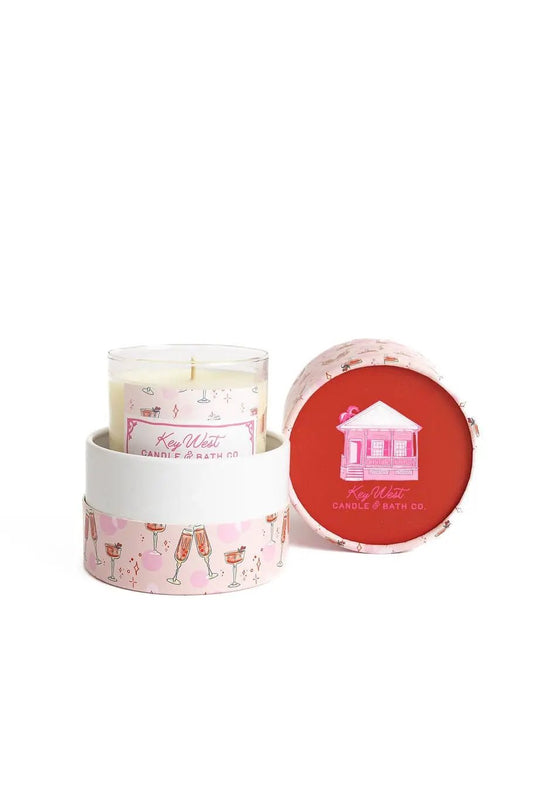 Cranberry Prosecco soy candle 12oz in pink tin with white wrap by Key West Candle & Bath Co on Tampa Home & Garden Store