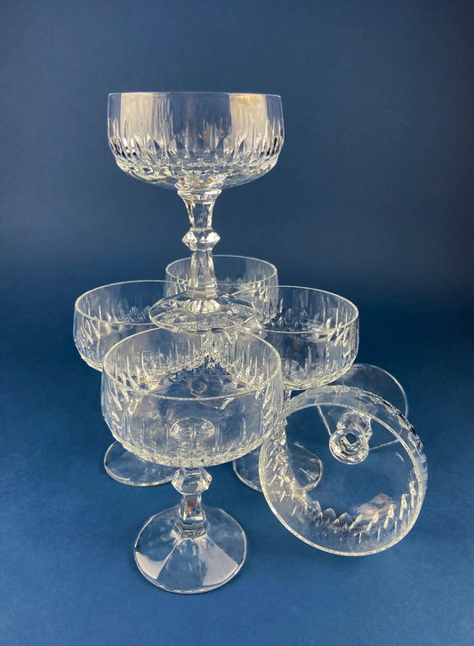 Cut crystal champagne glasses with geometric motif, clear stemware, set of stacked coupe glasses on Tampa Home & Garden Store