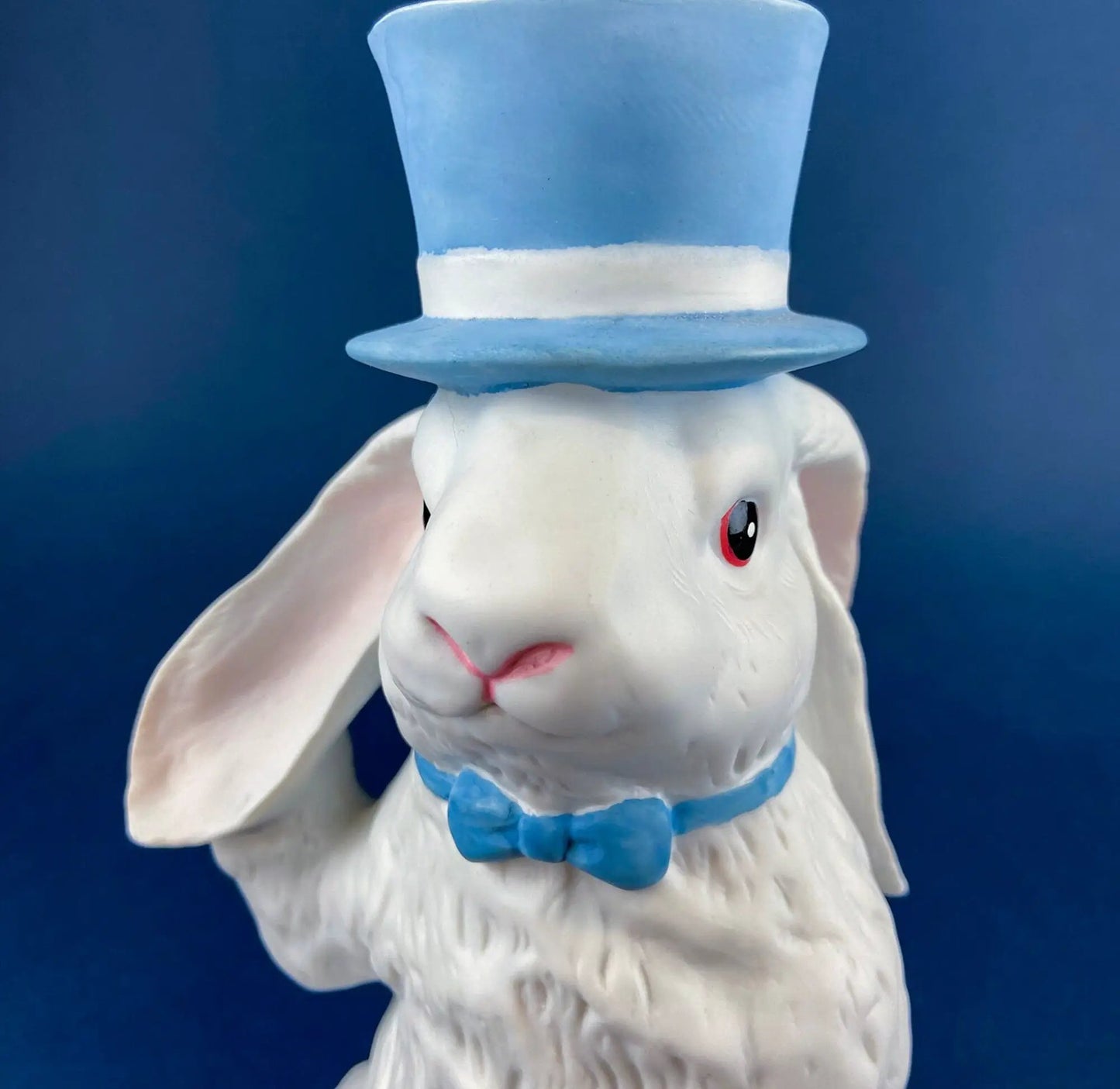 Porcelain white bunny figurine with a blue top hat and scarf on Tampa Home & Garden Store