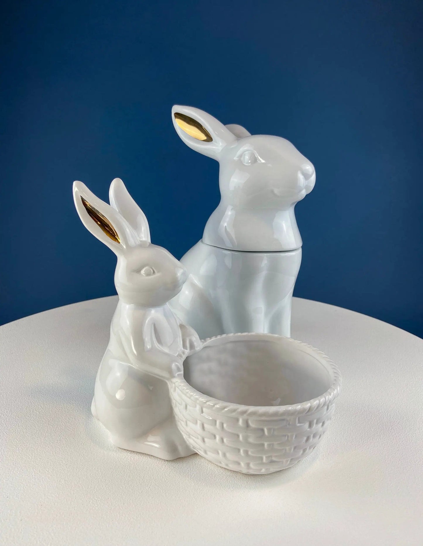 Pair of white ceramic bunny planters with woven basket base and gold-tinted ears Easter decor on Tampa Home & Garden Store