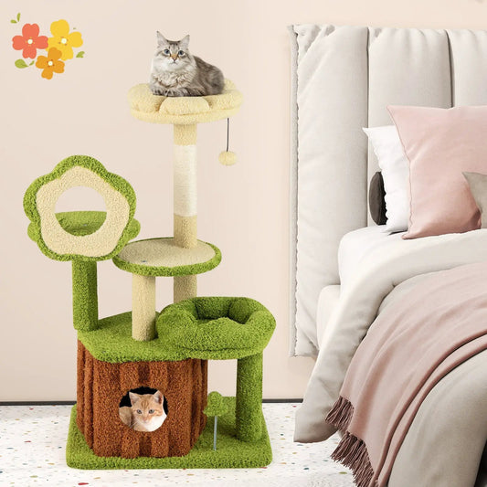Green cat tree with condo and multi-level tower in green and beige plush, kitten in base hole on Tampa Home & Garden Store