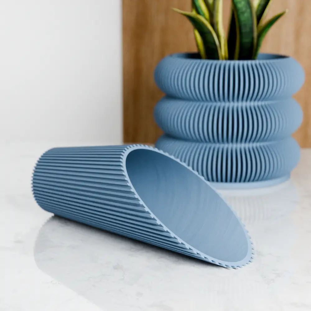 Cylindrical soil scoop, blue ribbed plastic, tidy garden work on Tampa Home & Garden Store