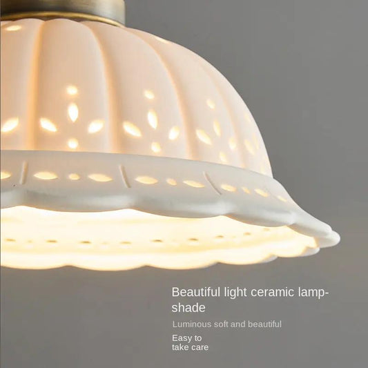 Copper bedside pendant light with white ceramic scalloped shade for modern bedrooms on Tampa Home & Garden Store