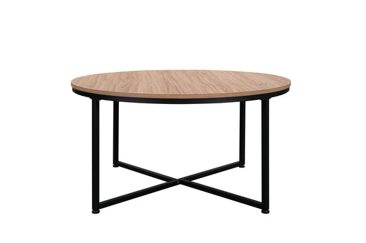 Modern round coffee table with wood grain top and black metal legs on Tampa Home & Garden Store