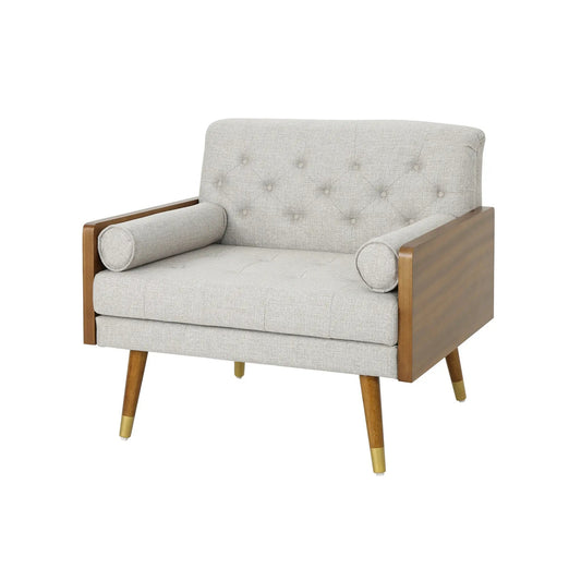 Beige fabric club chair with tufted back, cylindrical arm cushions, and wood frame on Tampa Home & Garden Store