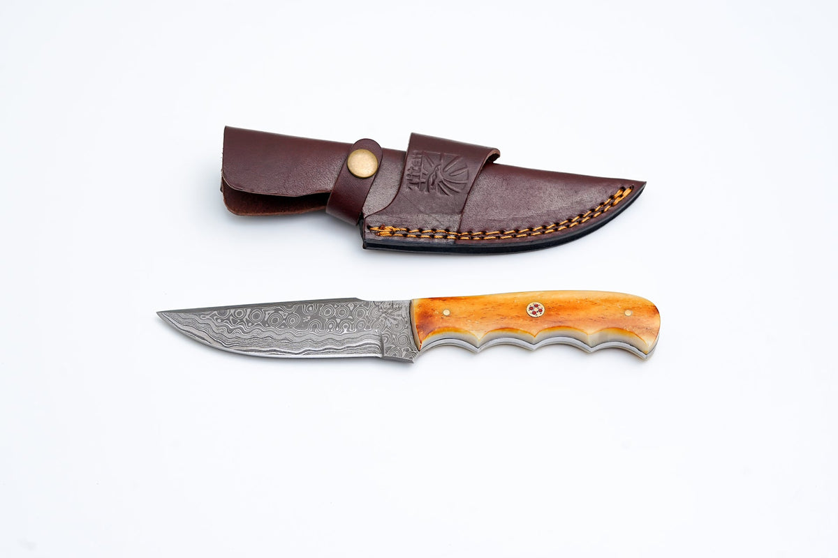 Damascus steel knife TD-711 with burnt bone scales and orange handle, leather sheath on Tampa Home & Garden Store