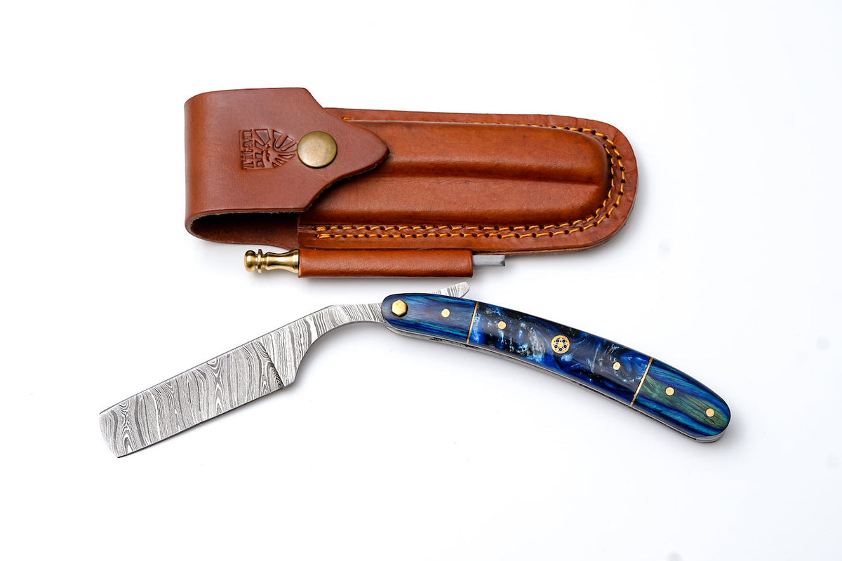 Damascus straight razor TK-528 by Titan International K with blue resin handle and brass pins, includes brown leather sheath on Tampa Home & Garden Store