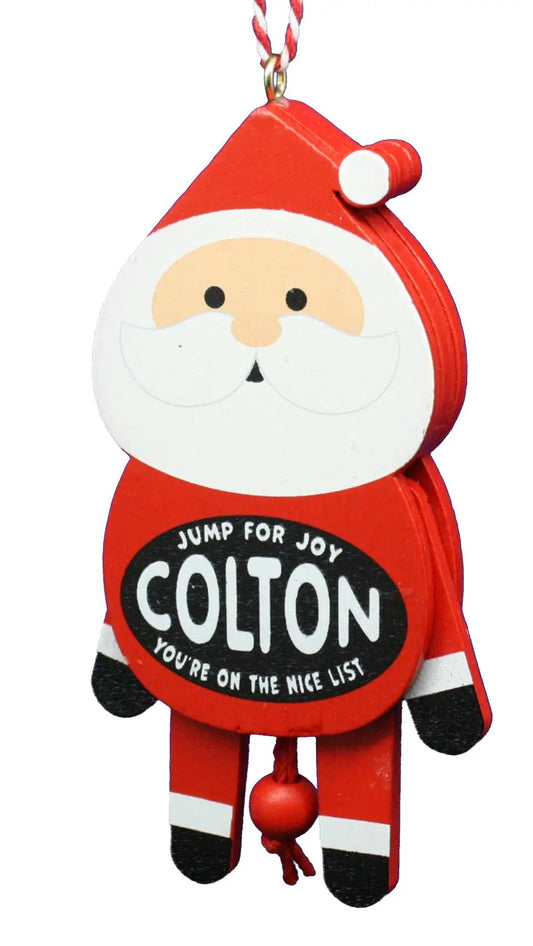 Dancing wooden Santa ornament in red with white beard and black boots COLTON label for tree on Tampa Home & Garden Store